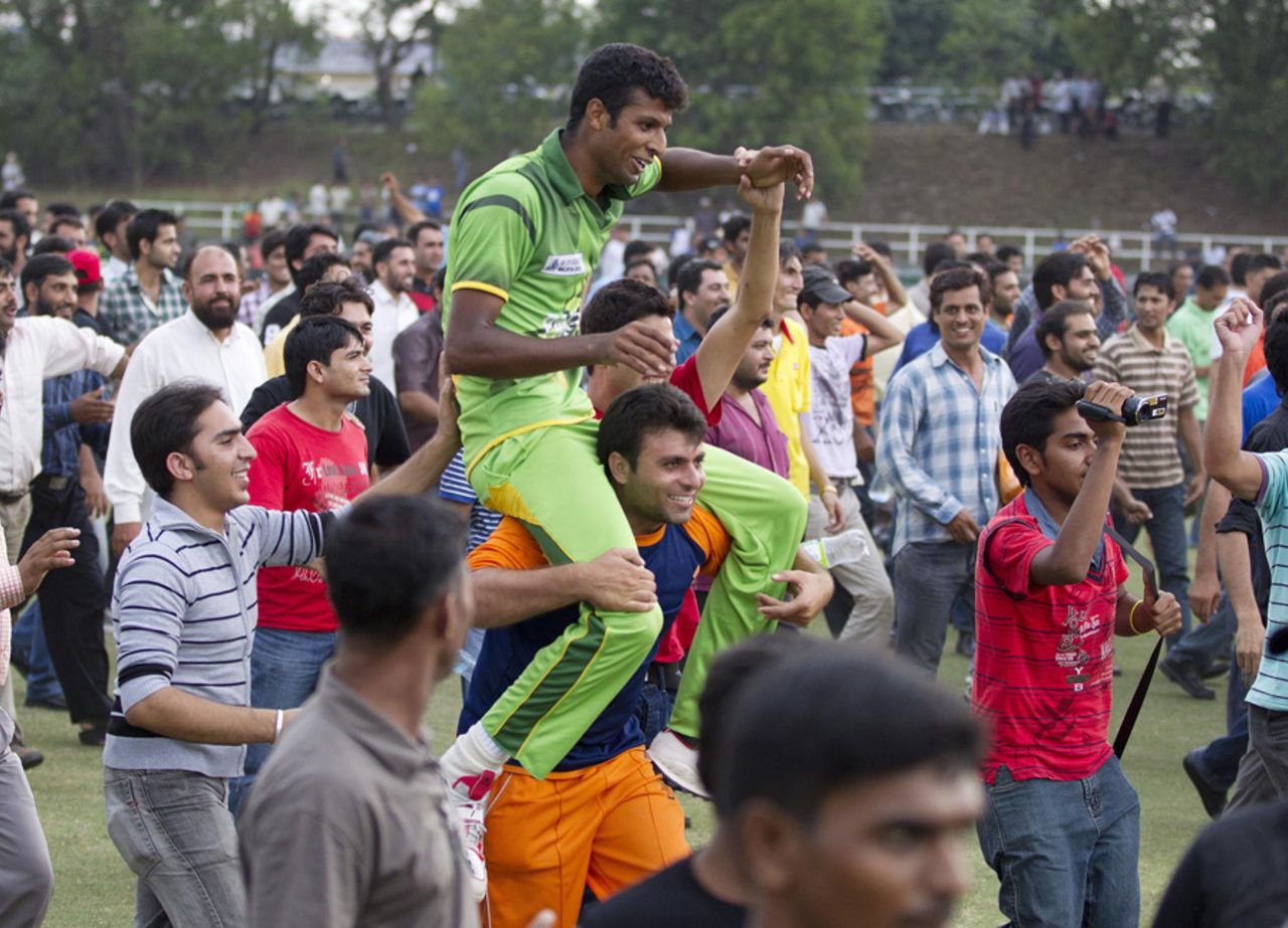 Ehsan Adil is carried by fans after he took the last wicket to tie the match, Pakistan Under-19s v India Under-19s, Final, Under-19s Asia Cup, Kinrara Academy Oval, Kuala Lumpur, July 1, 2012