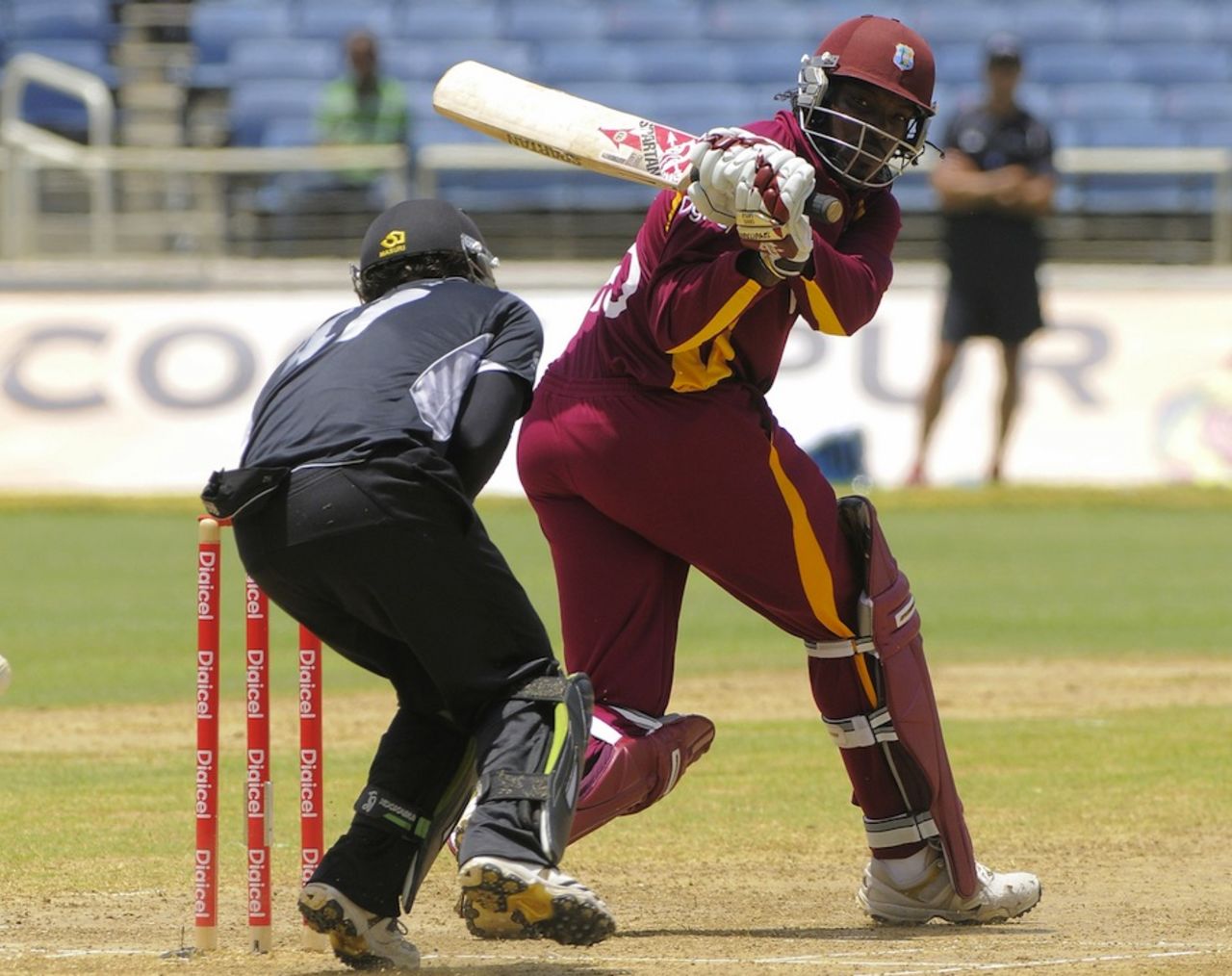 Chris Gayle hits a boundary to get to his 20th ODI century, West Indies v New Zealand, 2nd ODI, Kingston, July 7, 2012