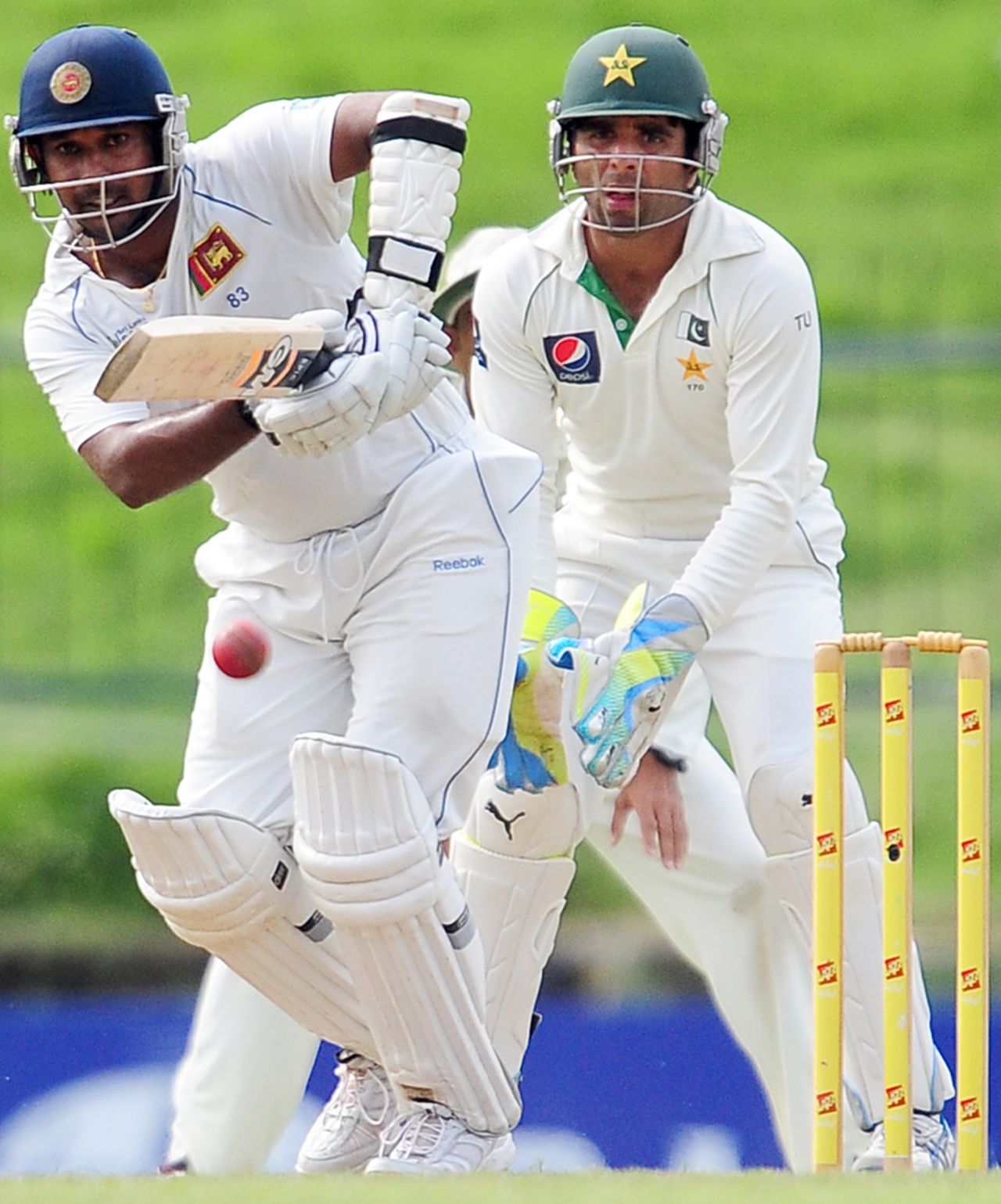 Makeshift keeper Taufeeq Umar looks on as Prasanna Jayawardene hits the ball to the leg side, Sri Lanka v Pakistan, 3rd Test, Pallekele, 3rd day, July 10, 2012