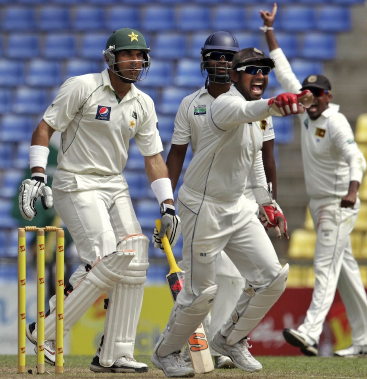 Sri Lanka celebrate the fall of Misbah-ul-Haq's wicket, Sri Lanka v Pakistan, 3rd Test, Pallekele, 4th day, July 11, 2012