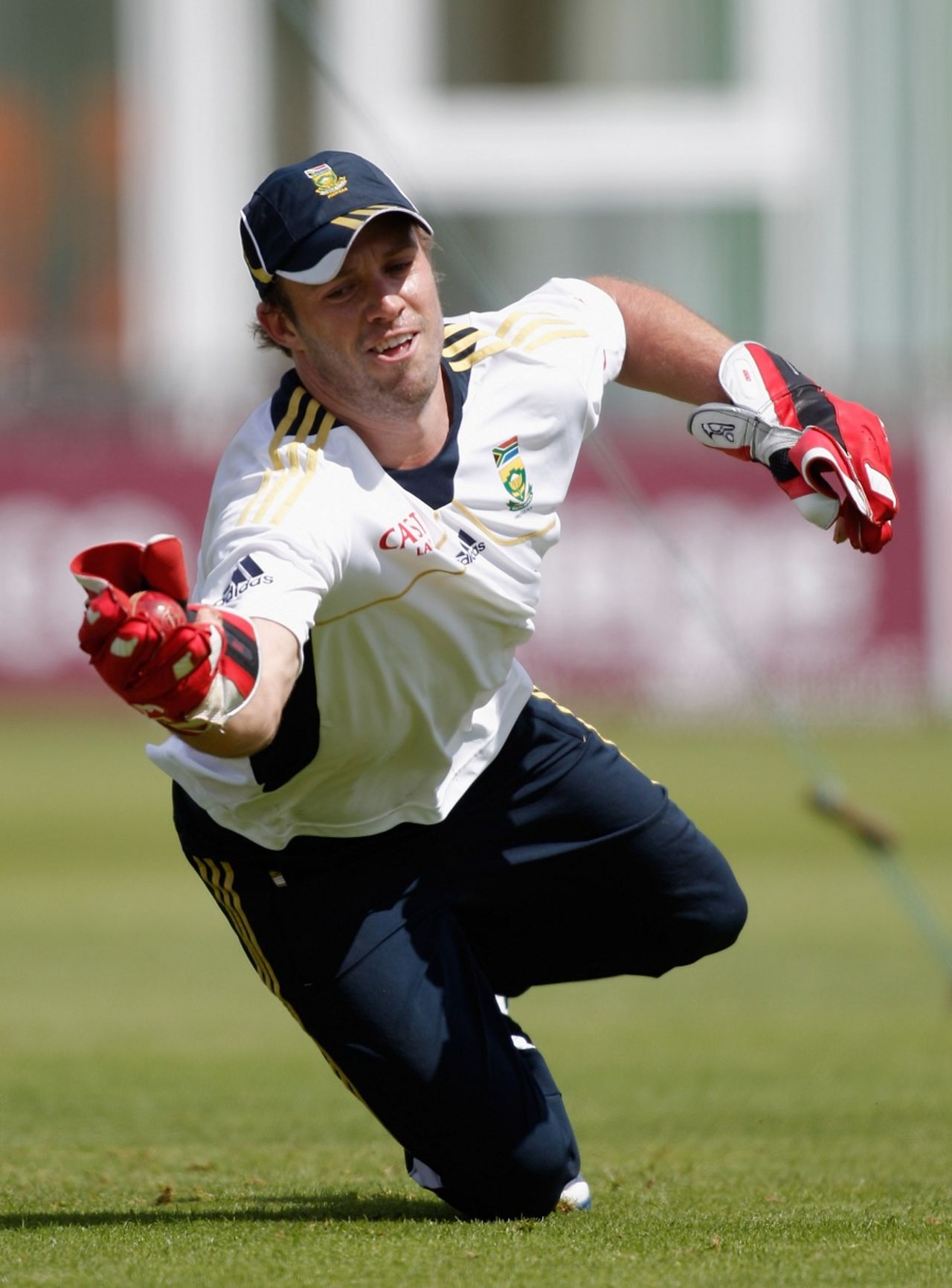 AB de Villiers takes a catch during wicketkeeping practice, Canterbury, July 12, 2012