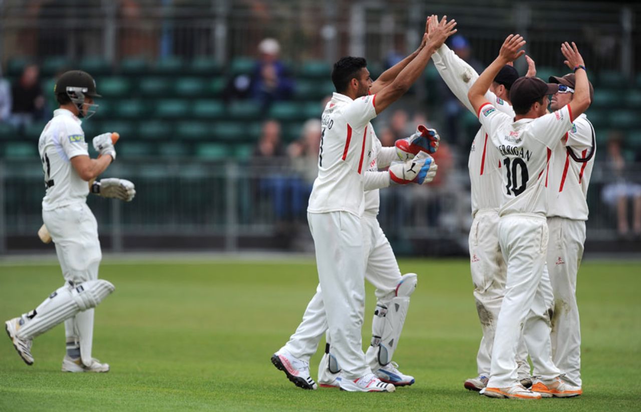 Ajmal Shahzad celebrates taking the wicket of Zafar Ansari, Surrey v Lancashire, County Championship, Division One, 3rd day, Guildford, July 11, 2012