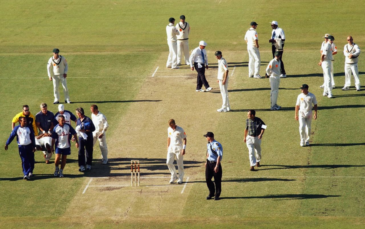 Alex Tudor is taken off on a stretcher after being hit by a ball from Brett Lee, Australia v England, 3rd Test, 3rd day, Perth, December 1, 2002