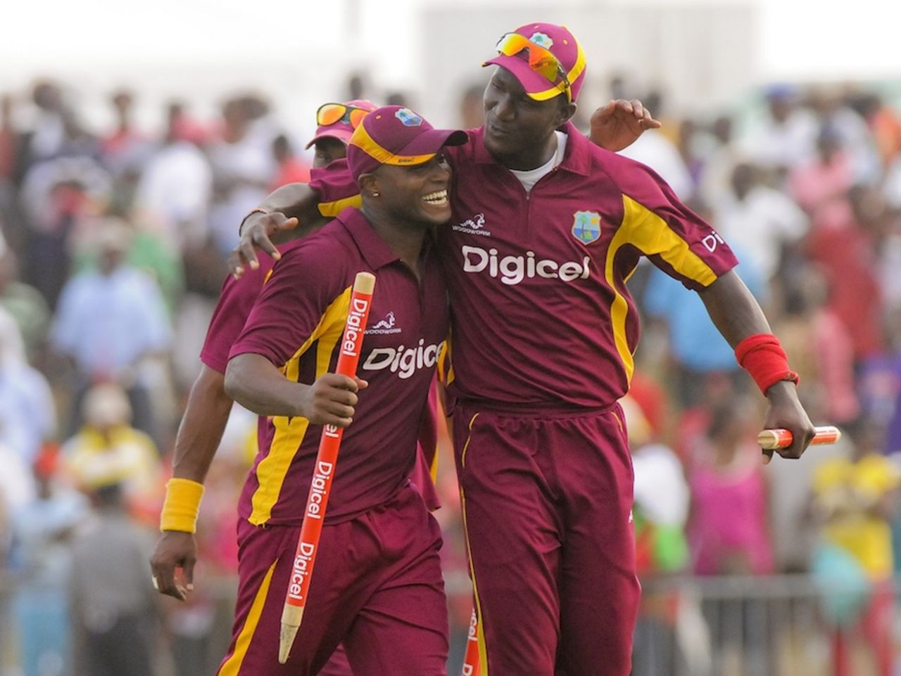 Darren Sammy and Tino Best walk off the field after the victory, West Indies v New Zealand, 4th ODI, Basseterre, July 14, 2012