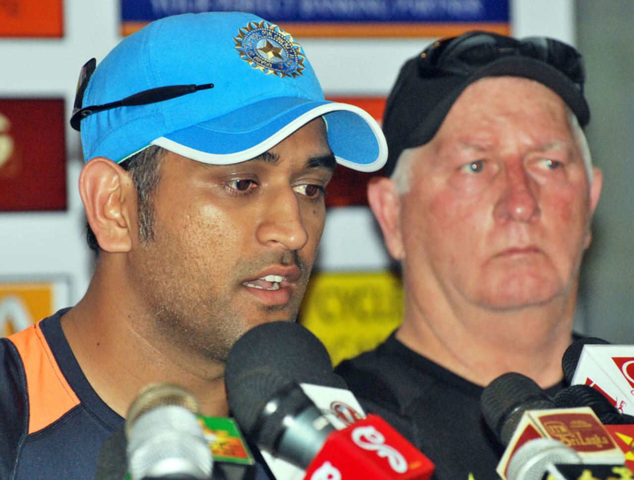 MS Dhoni with Duncan Fletcher at a press conference in Colombo, July 18, 2012