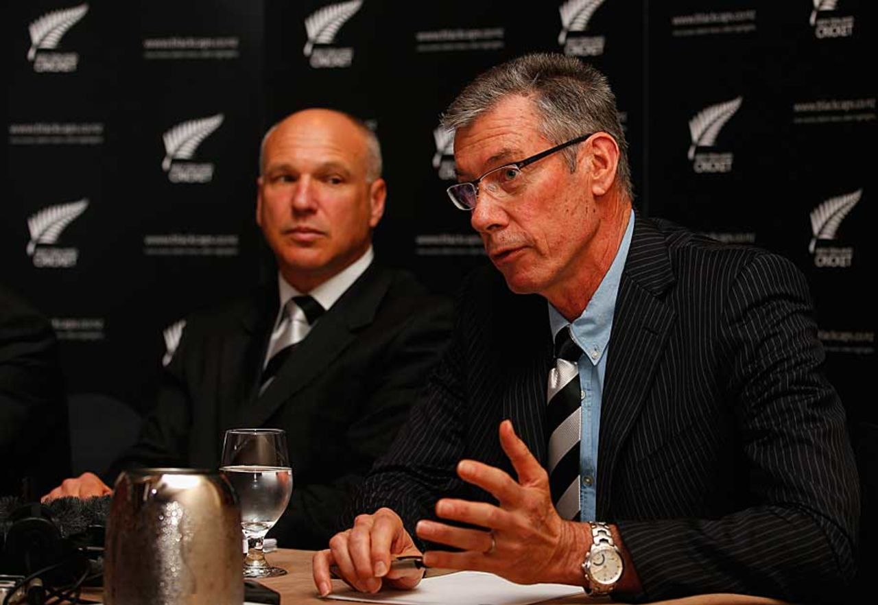 New Zealand Cricket chief executive David White looks on as John Buchanan speaks to the press, Auckland, July 20, 2012