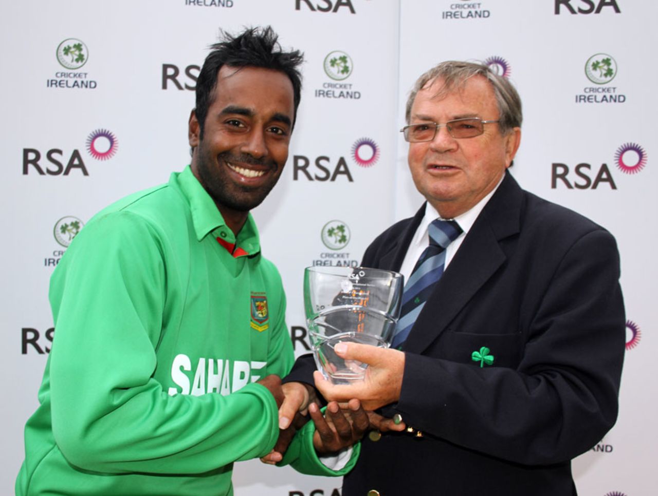 Elias Sunny receives his Man of the Match award, Ireland v Bangladesh, 1st T20, Stormont, July, 18, 2012