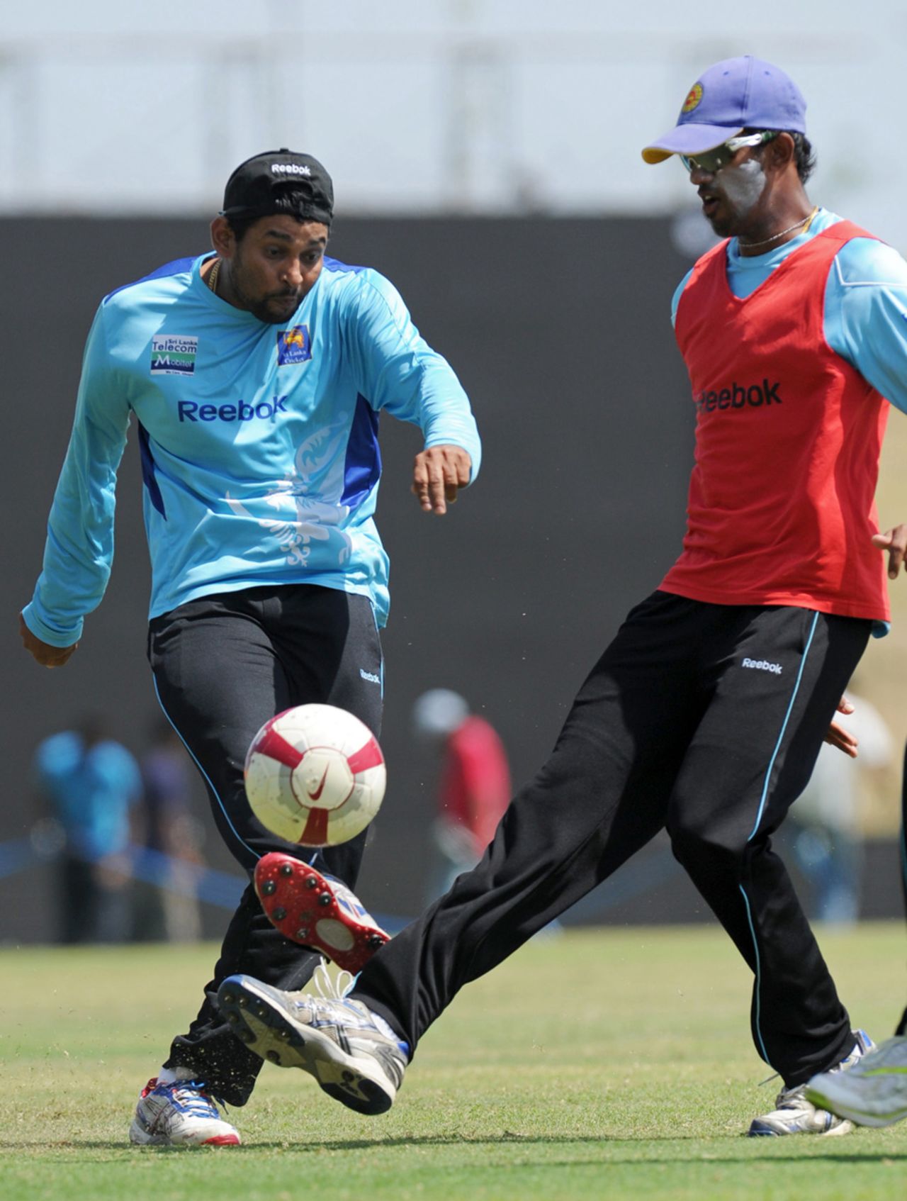 Tillakaratne Dilshan plays football with Sachithra Senanayake, Hambantota, July 23, 2012