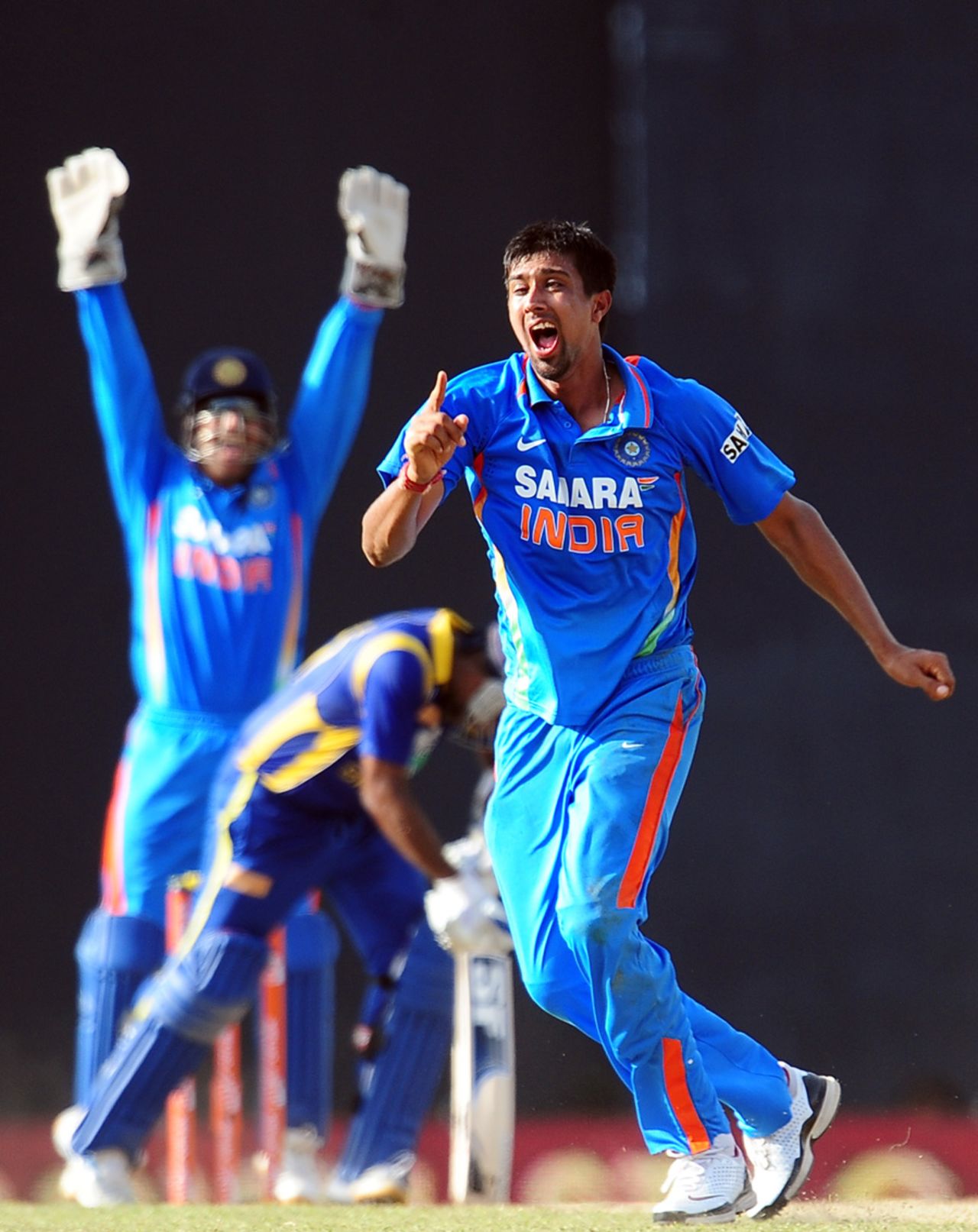 Rahul Sharma celebrates after dismissing Mahela Jayawardene, Sri Lanka v India, 3rd ODI, Colombo, July 28, 2012