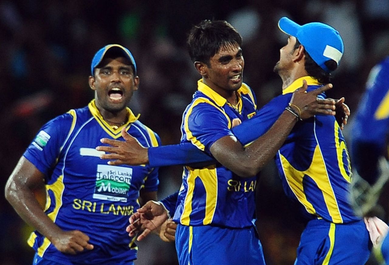 Nuwan Pradeep is congratulated after taking Rohit Sharma's wicket, Sri Lanka v India, 4th ODI, Colombo, July 31, 2012