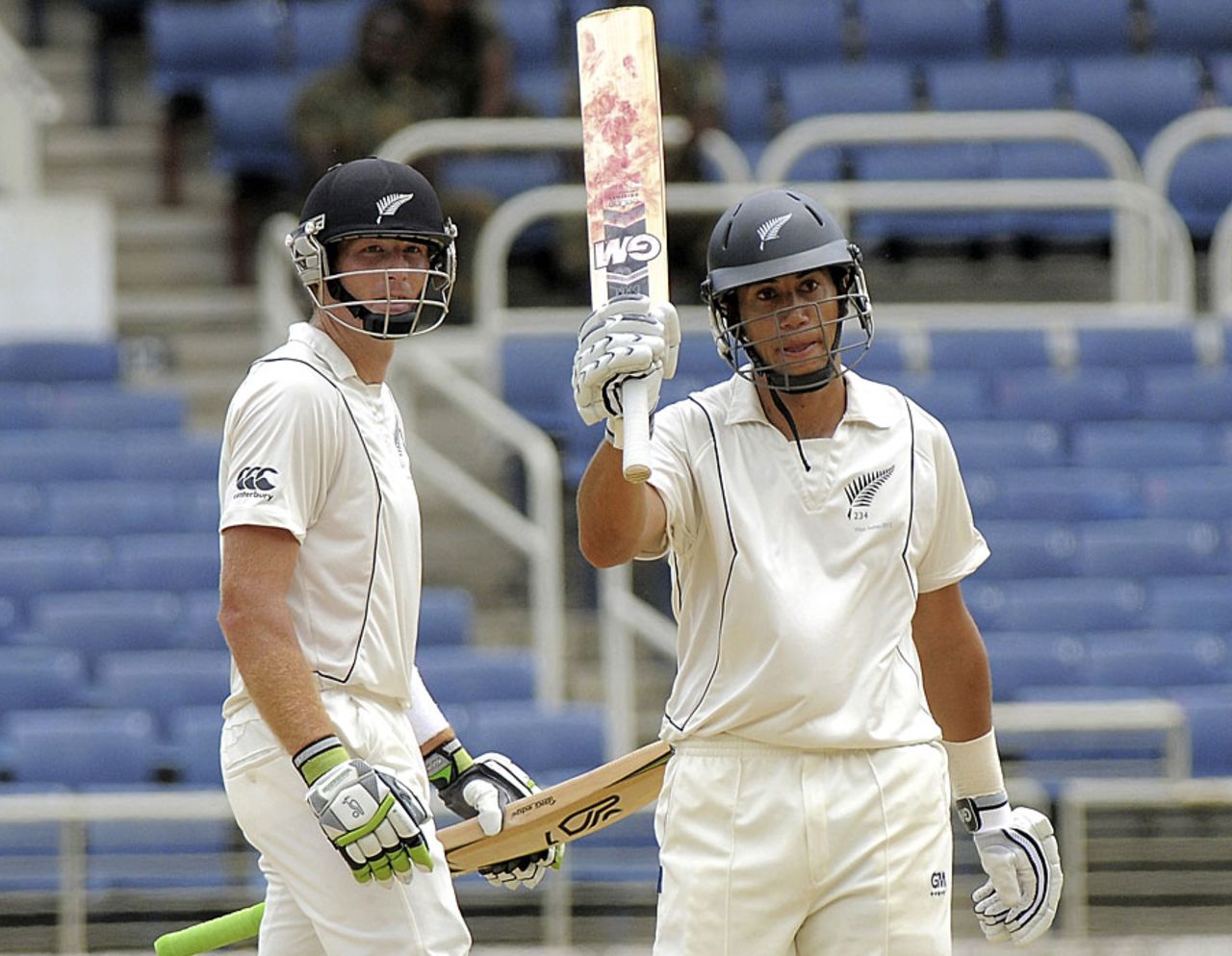 Ross Taylor celebrates his fifty as Martin Guptill looks on, West Indies v New Zealand, 2nd Test, Jamaica, 1st day, August 2, 2012