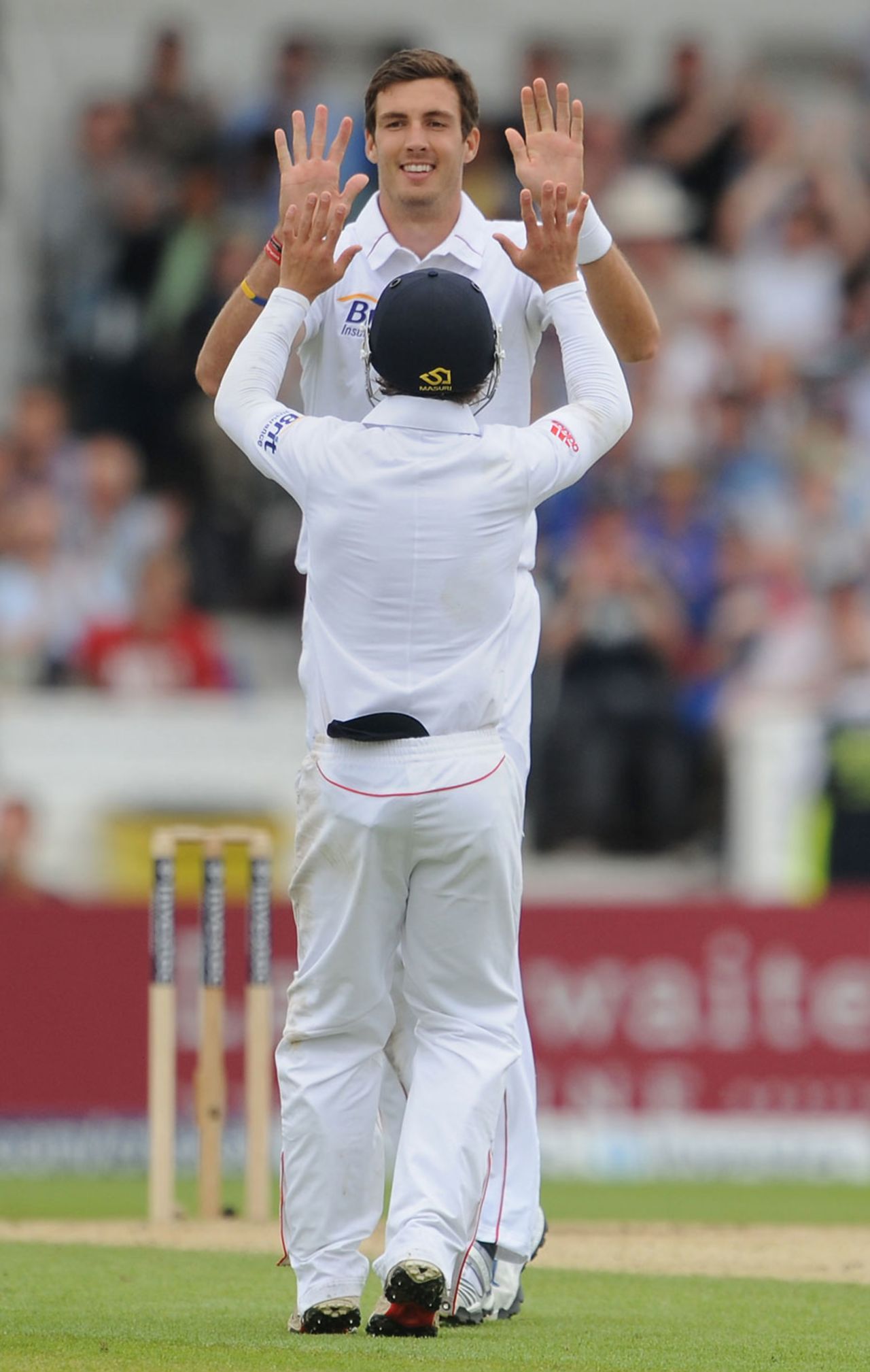 James Taylor does his best to reach Steven Finn for a high five, 2nd Investec Test, Headingley, 2nd day, August 3, 2012