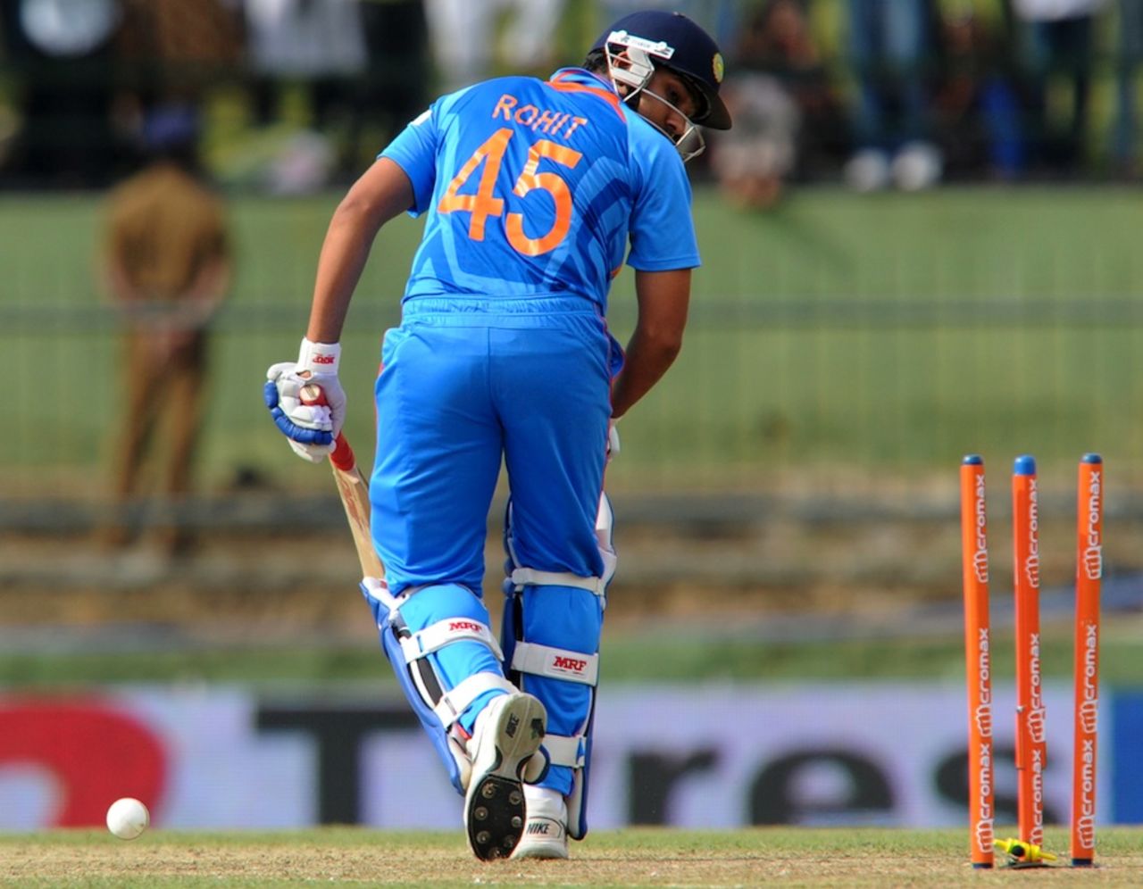 Rohit Sharma looks back at his broken stumps, Sri Lanka v India, 5th ODI, Pallekele, August 4, 2012