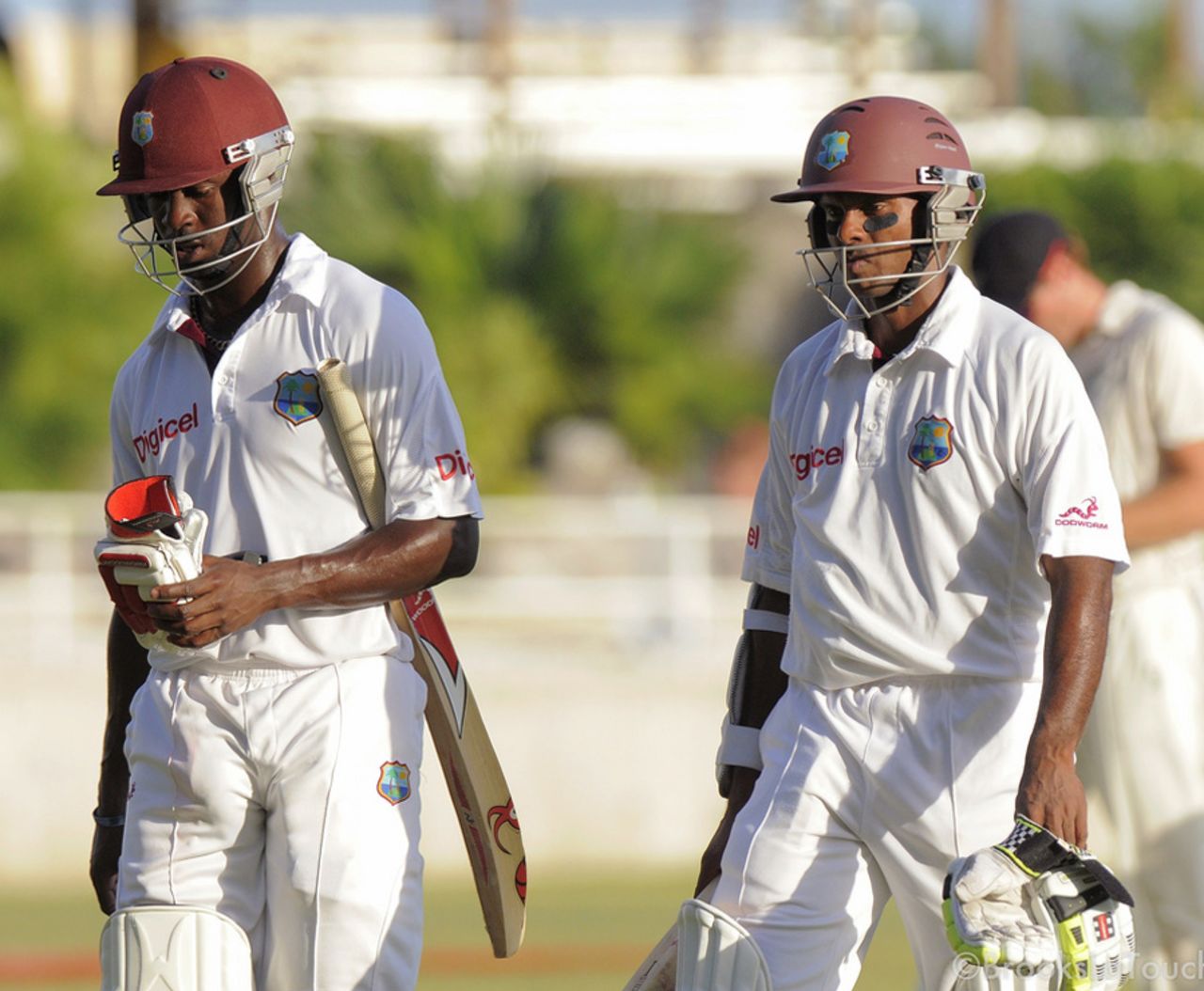 Kemar Roach and Shivnarine Chanderpaul walk back after the third day's play, West Indies v New Zealand, 2nd Test, Kingston, 3rd day, August 4, 2012