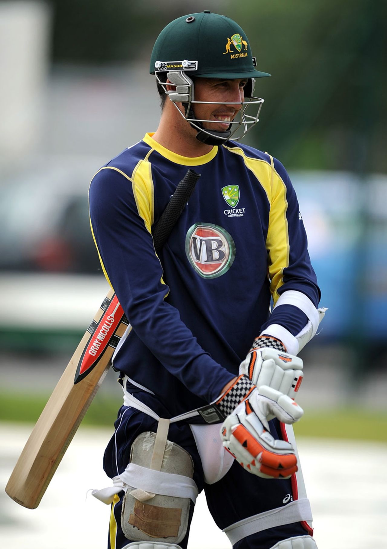 Tom Cooper pulls on his gloves, Old Trafford, August 6, 2012