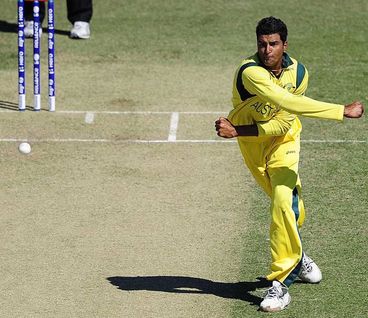 Gurinder Sandhu throws one hard down the pitch, Australia v Nepal, Group A, ICC Under-19 World Cup 2012, Townsville, August 13, 2012