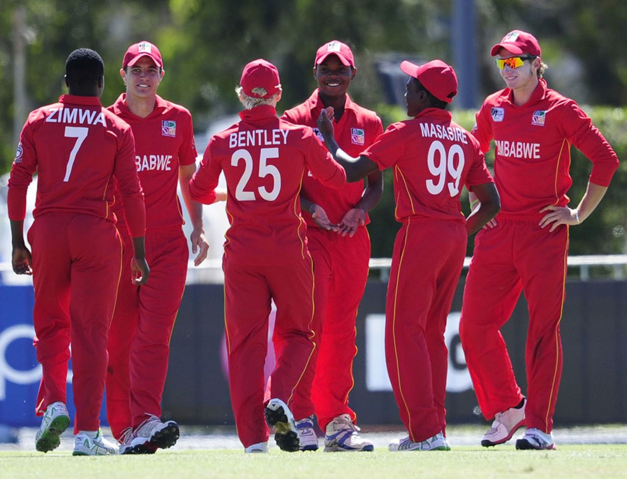 Zimbabwe's fielders celebrate an India dismissal, India v Zimbabwe, Group C, ICC Under-19 World Cup 2012, Townsville, August 14, 2012