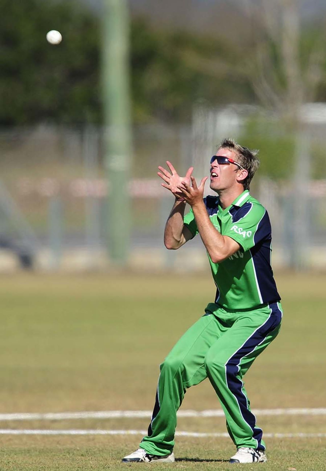 Graeme McCarter gets underneath the ball to take a catch and dismiss Prithu Baskota, Ireland v Nepal, ICC Under-19 World Cup, Group A, Townsville, August 15, 2012