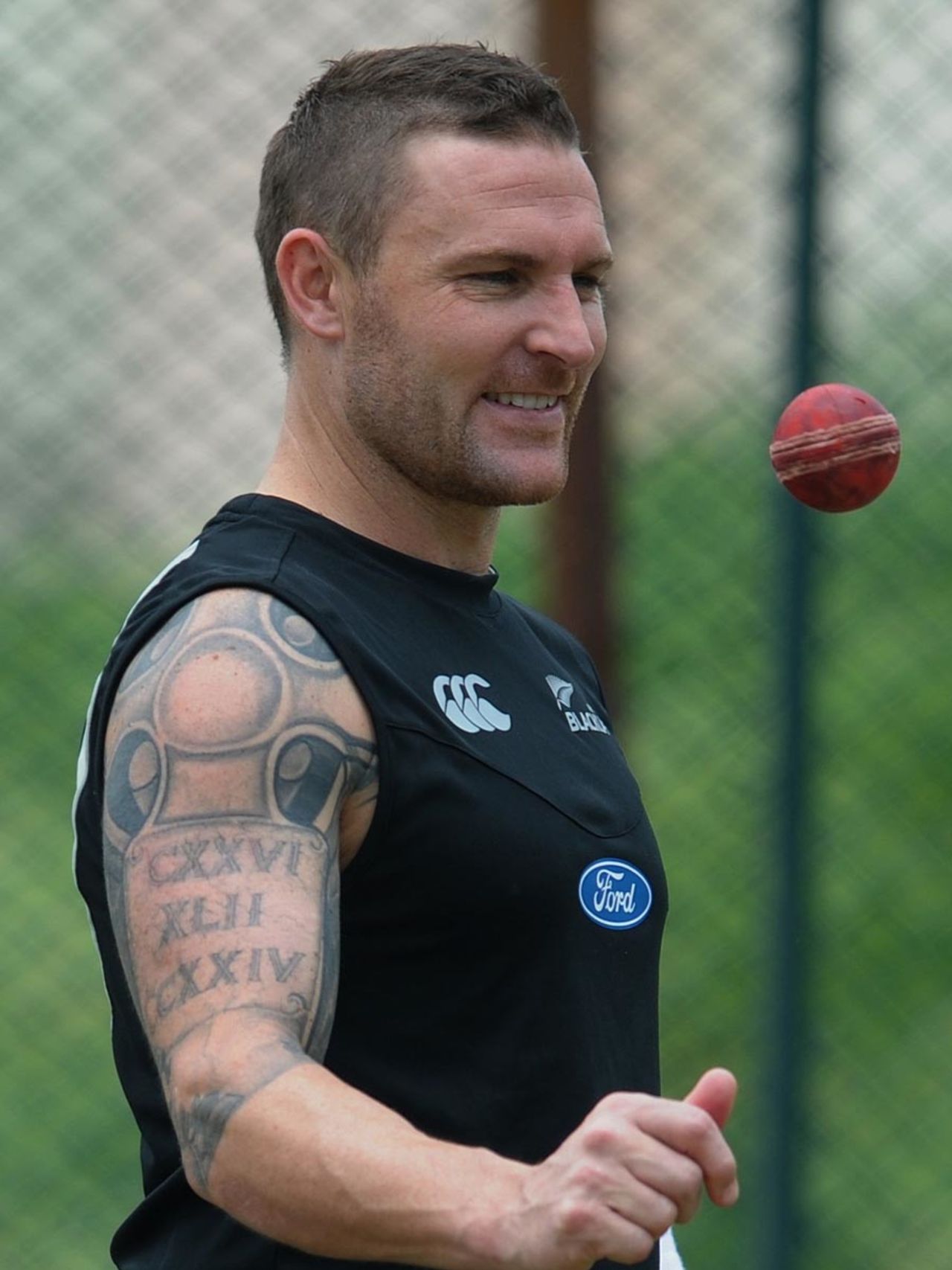 Brendon McCullum tosses the ball during a training session in Hyderabad, Hyderabad, August 20, 2012