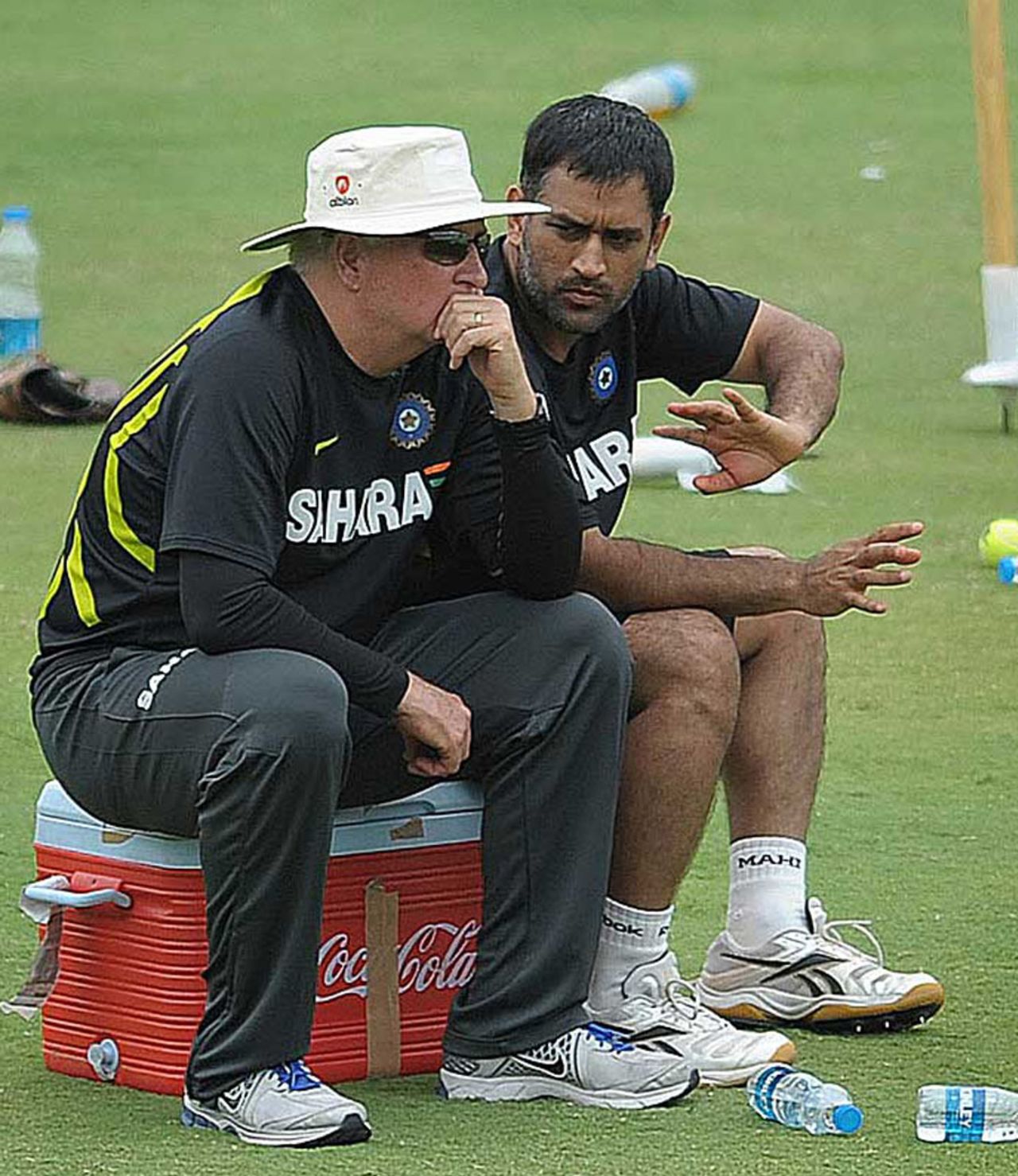 MS Dhoni and Duncan Fletcher have a word during a training session, Hyderabad, August 21, 2012