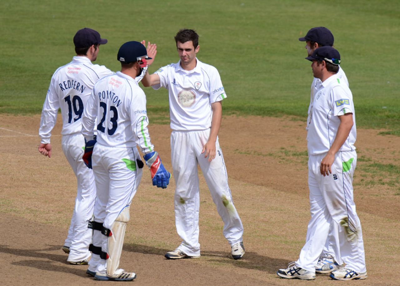 David Wainwright is congratulated by his team-mates on a dismissal, Northamptonshire v Derbyshire, County Championship, Division Two, Northampton, August 22, 2012