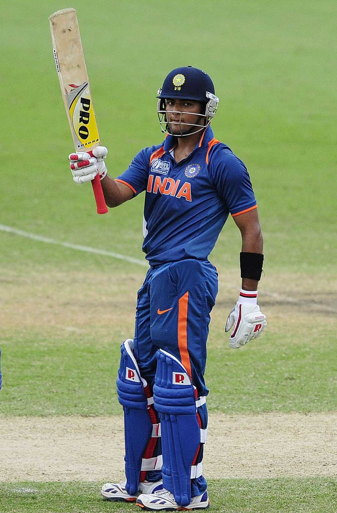 Unmukt Chand raises his bat upon reaching his century, Australia v India, ICC U-19 World Cup, final, Townsville, August 26, 2012