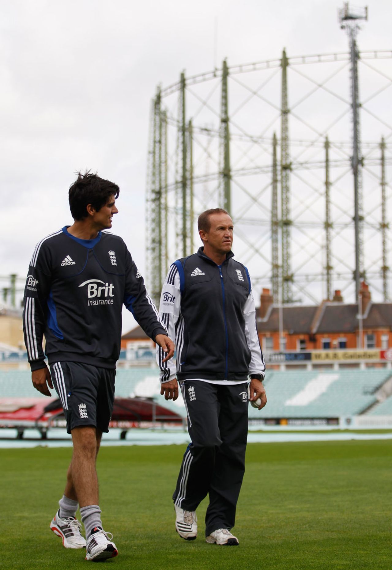 Alastair Cook and Andy Flower take a stroll across the outfield, The Oval, August 30, 2012