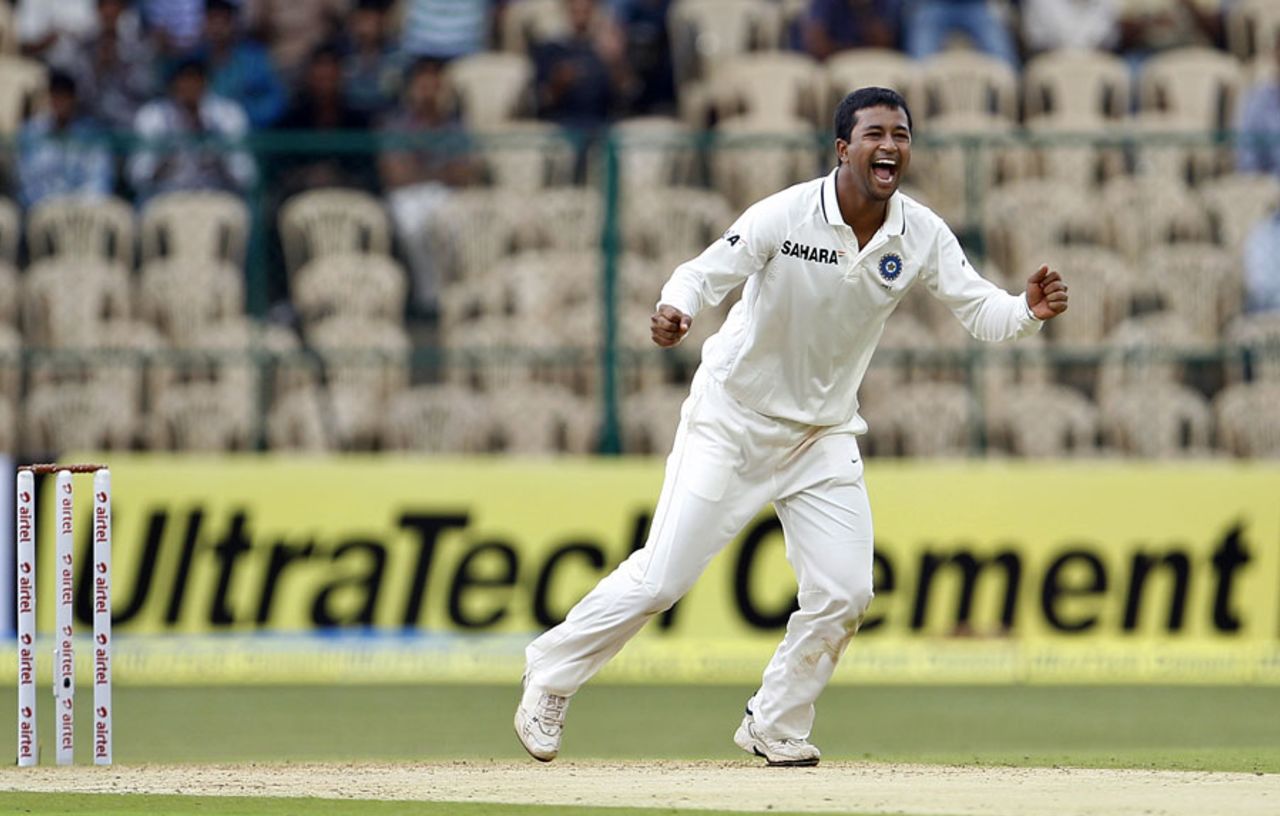 Pragyan Ojha is ecstatic after taking a wicket, India v New Zealand, 2nd Test, Bangalore, 1st day, August 31, 2012