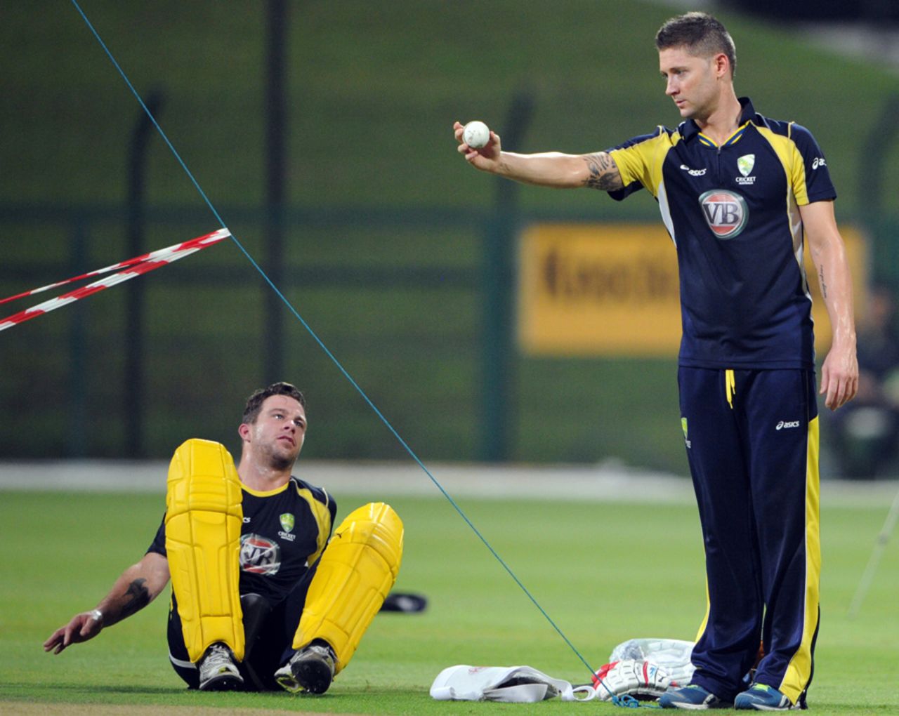 Michael Clarke and Matthew Wade chat during training, Abu Dhabi, August 30, 2012