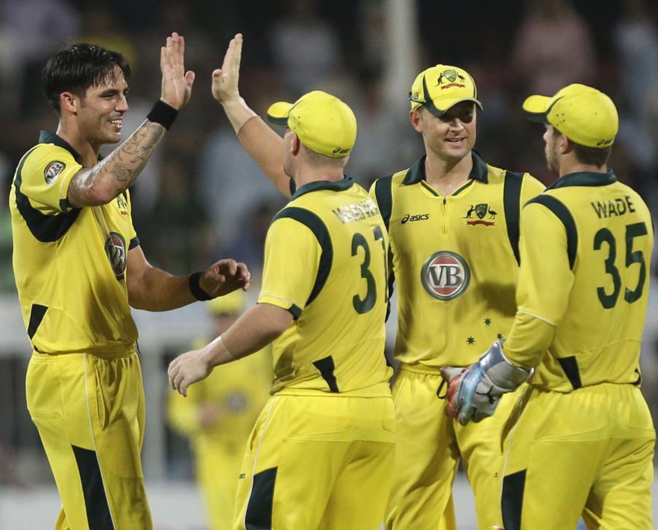 Mitchell Johnson celebrates a wicket with his team-mates, Pakistan v Australia, 3rd ODI, Sharjah, September 3, 2012
