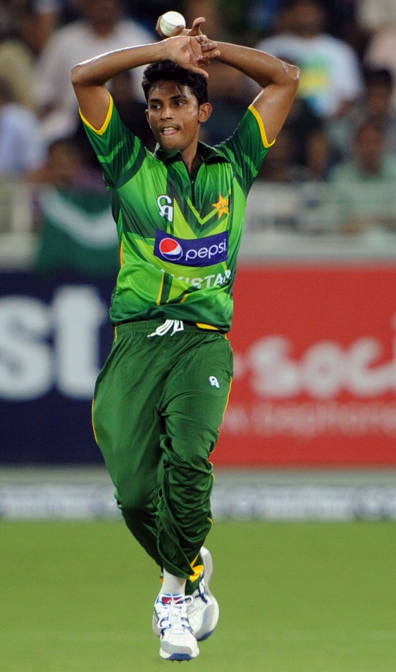 Raza Hasan runs in to bowl, Pakistan v Australia, 1st T20I, Dubai, September 5, 2012