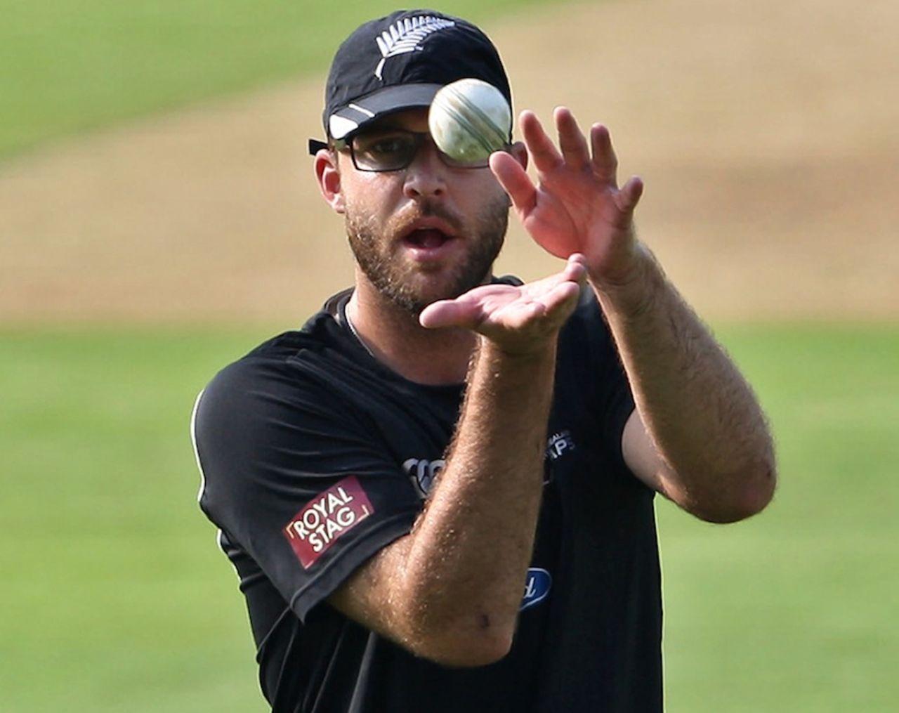 Daniel Vettori catches a ball during practice, Visakhapatnam, September 7, 2012