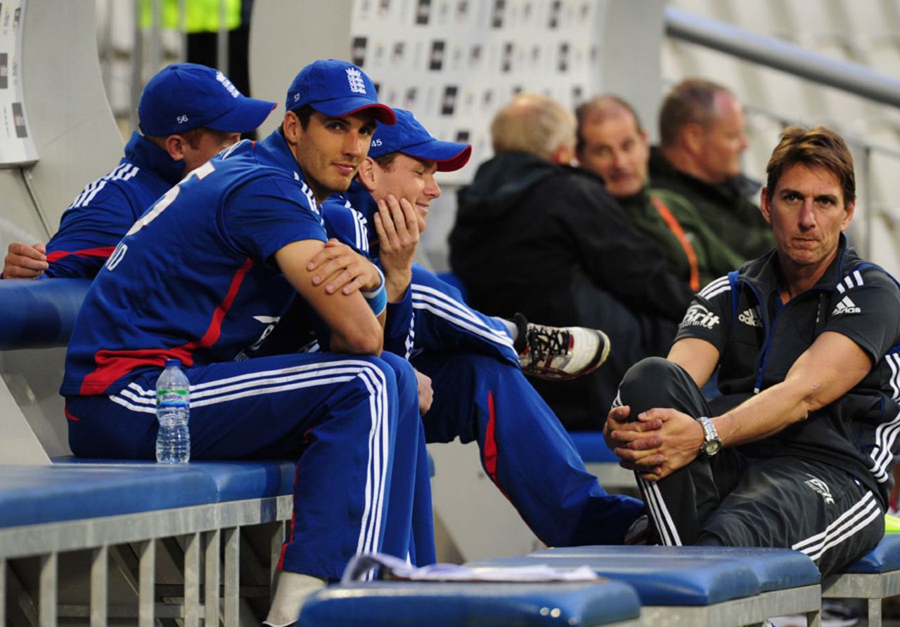England players sit in the dugout waiting for the rain to clear, England v South Africa, 2nd T20, Old Trafford, September, 10, 2012