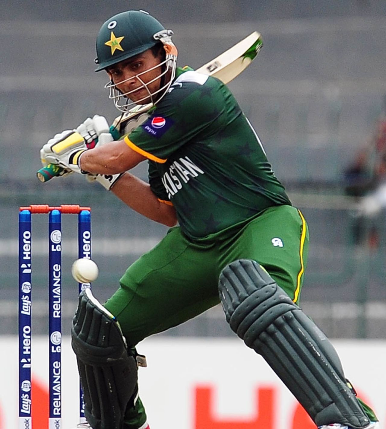 Karman Akmal prepares to play the cut, India v Pakistan, World Twenty20 warm-ups, Colombo, September 17, 2012