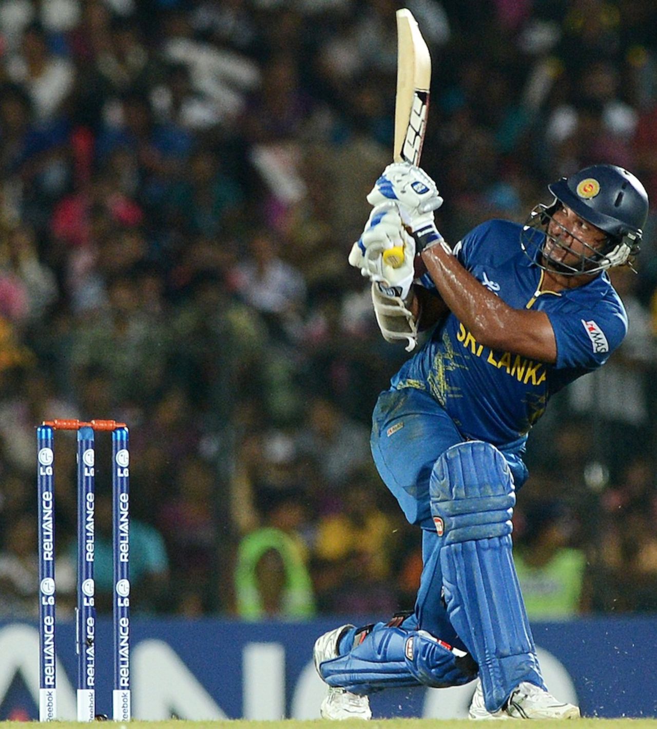 Kumar Sangakkara slog-sweeps a ball, Sri Lanka v Zimbabwe, Group C, World T20 2012, Hambantota, September 18, 2012