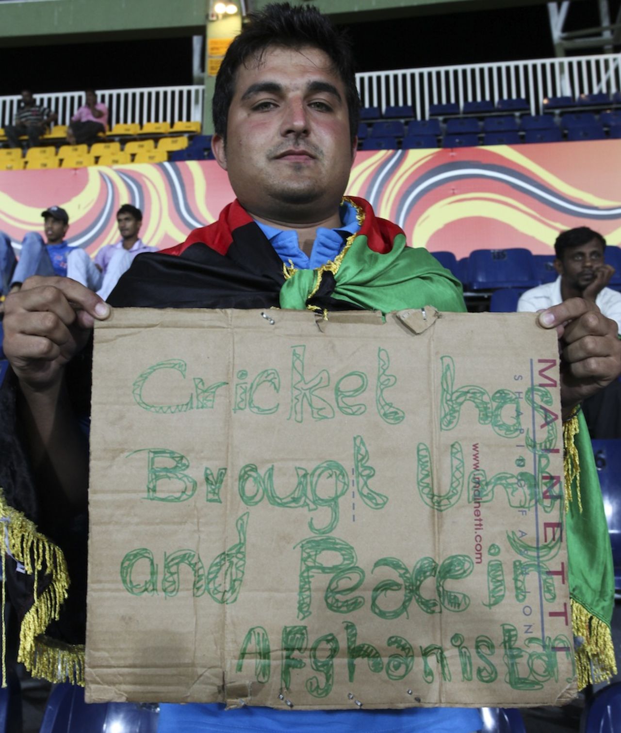 An Afghanistan supporter holds a placard , Afghanistan v England, World Twenty20 2012, Group A, Colombo, September 21, 2012