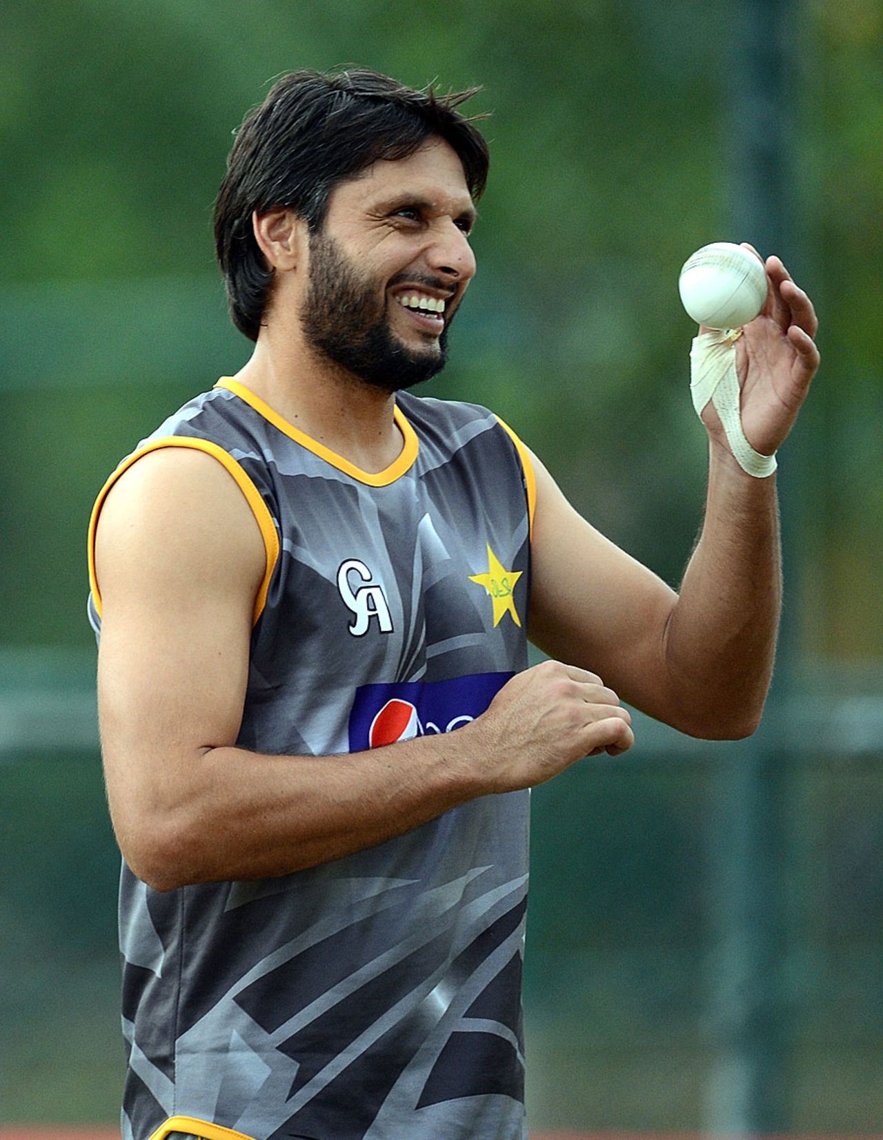 Shahid Afridi gets read to bowl at the nets, Pallekele, September 22, 2012