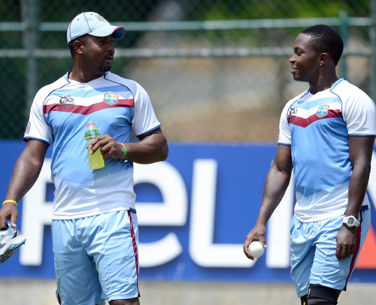 Dwayne Smith and Fidel Edwards chat during a training session, Pallekele, September 26, 2012