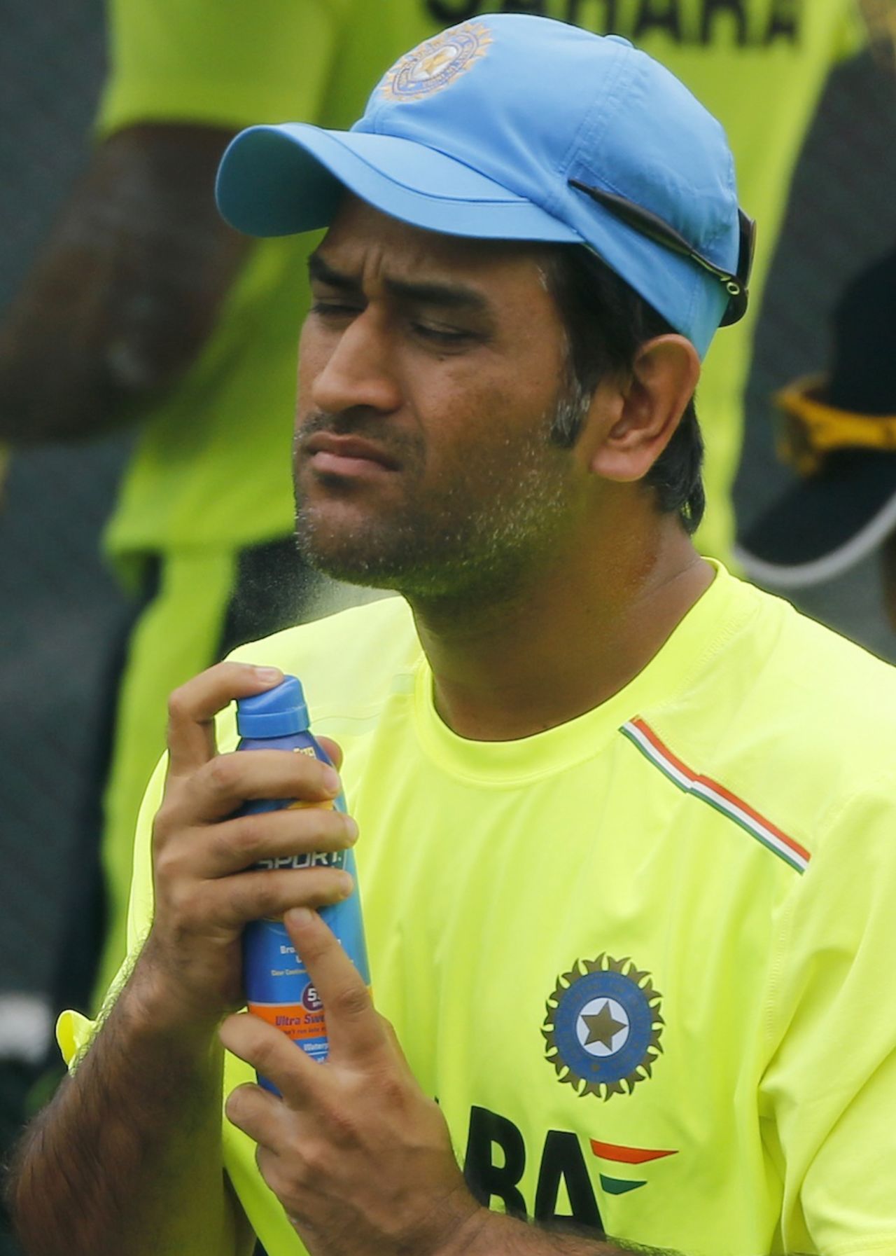 MS Dhoni applies sun cream  during the practice session, World T20 2012, Colombo, September 27, 2012