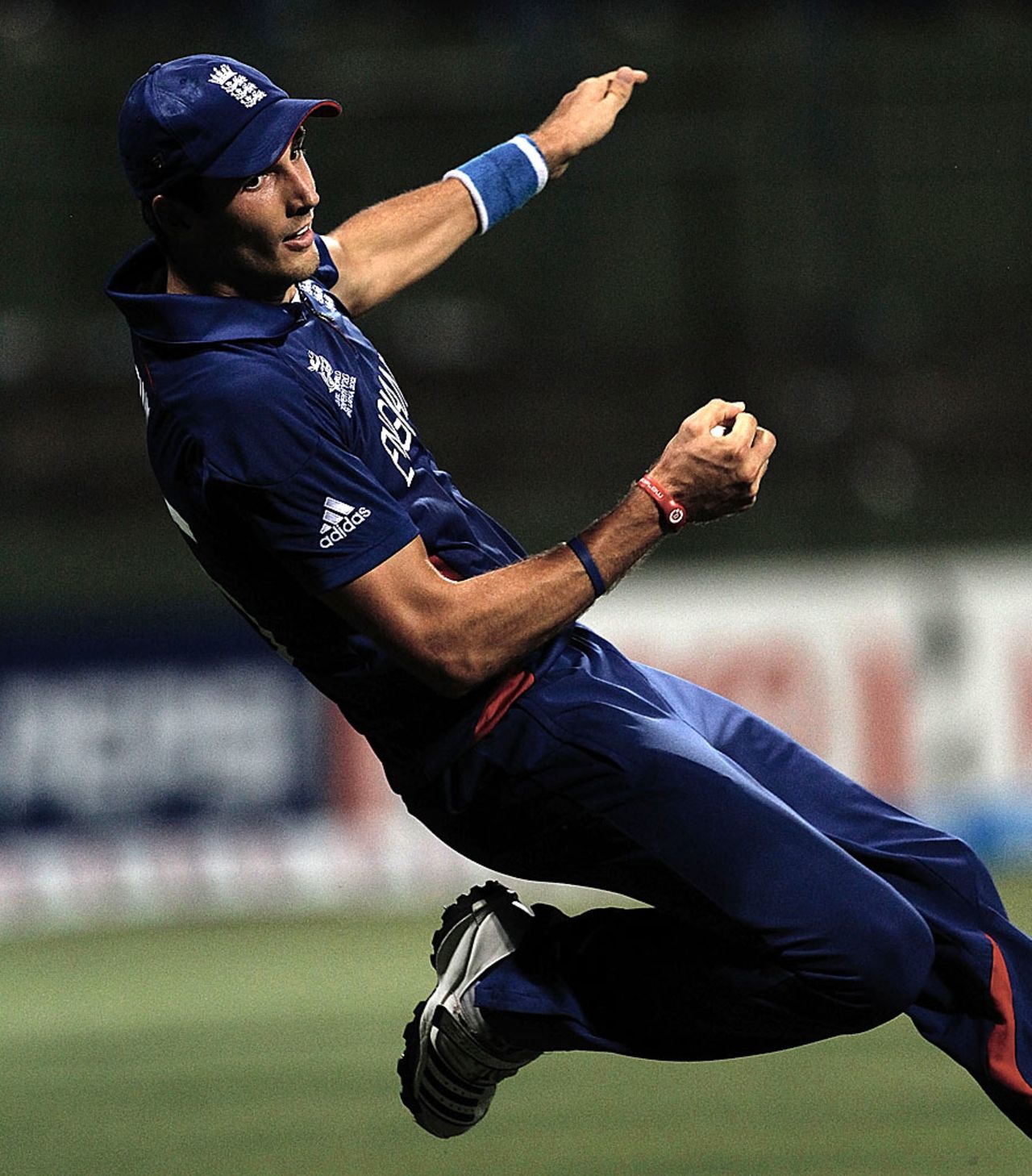 Steven Finn falls backwards as he catches Chris Gayle, England v West Indies, World Twenty20 2012, Super Eights, Pallekele, September 27, 2012