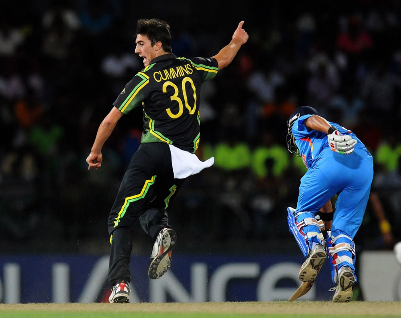 Pat Cummins kicks the ball onto the stumps to run out Gautam Gambhir, Australia v India, World T20 2012, Colombo, September, 28, 2012