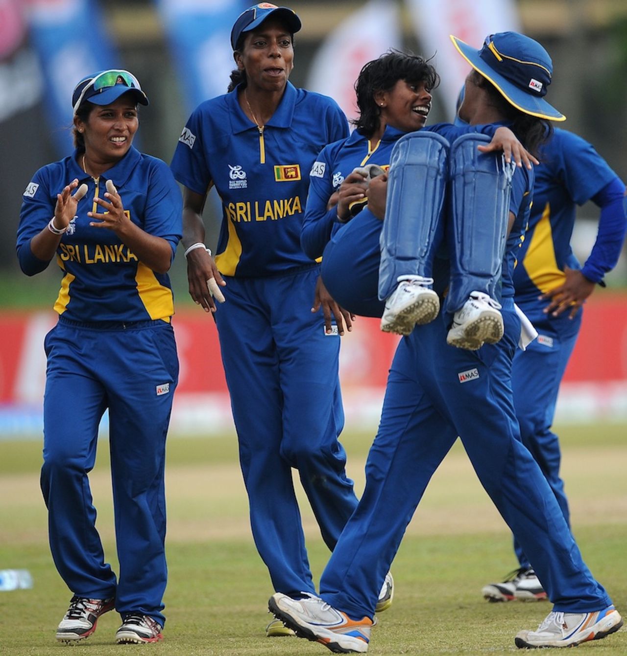 Dilani Manodara is carried by Chamari Atapattu, Sri Lanka v West Indies, Women's World T20, Group B, Galle, September 28, 2012