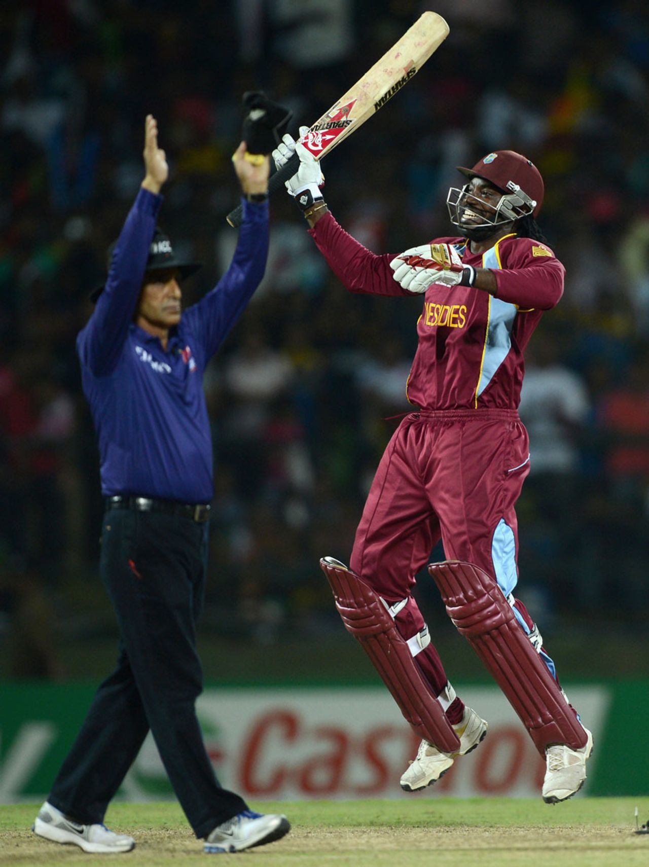 Chris Gayle sets off in celebration as West Indies win the Super Over, New Zealand v West Indies, Super Eights, World Twenty20 2012, Pallekele, October 1, 2012