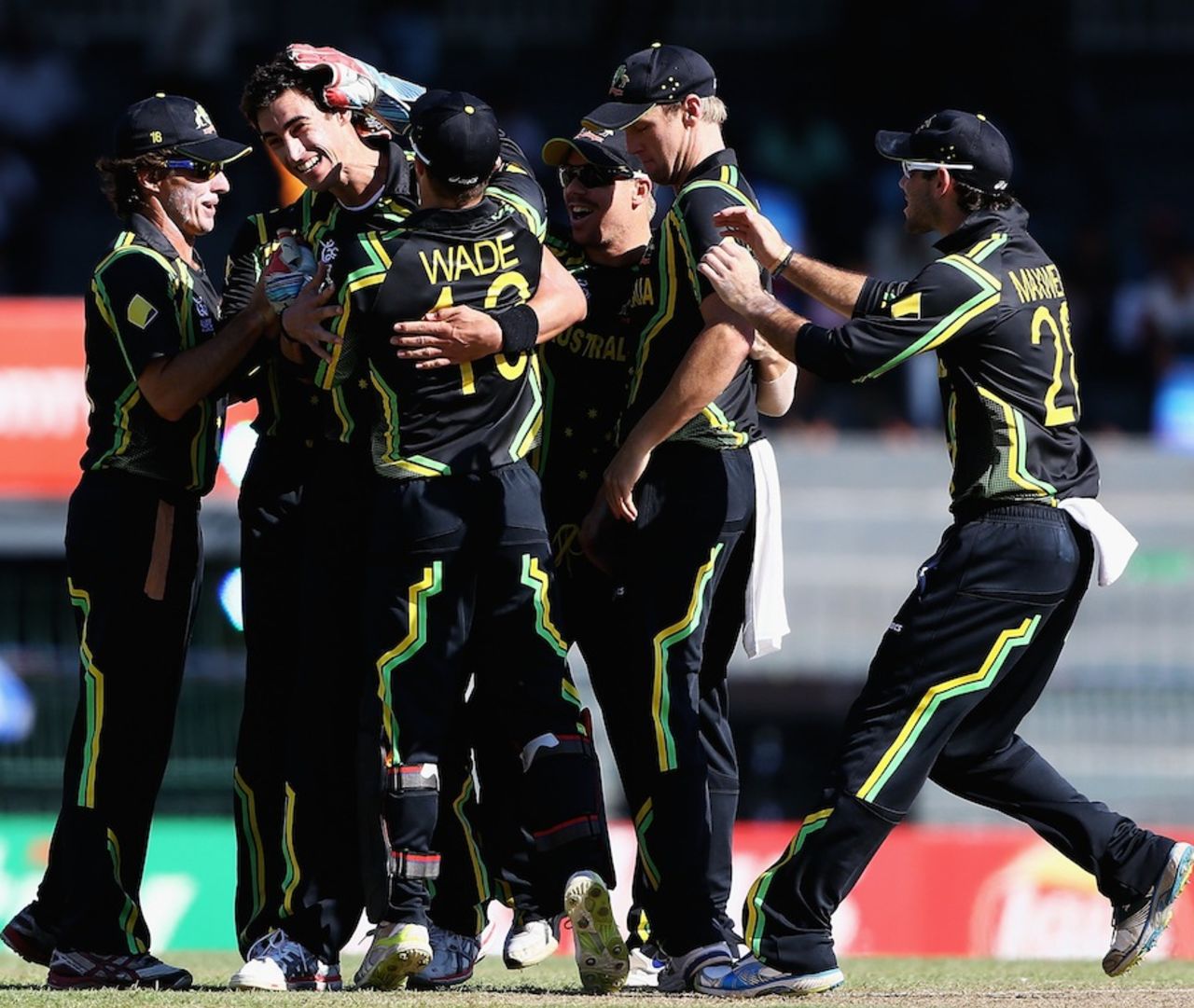 Mitchell Starc is mobbed by team-mates, Australia v Pakistan, Super Eights, World Twenty20 2012, Colombo, October 2, 2012