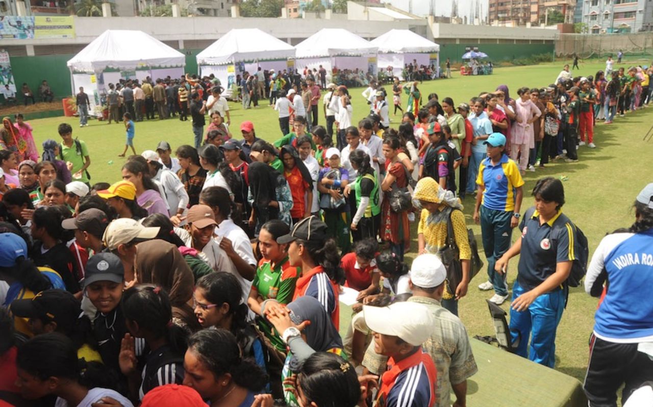 Women of all ages queue up to register with the Bangladesh Cricket Board at the Academy ground, Mirpur, October 2, 2012