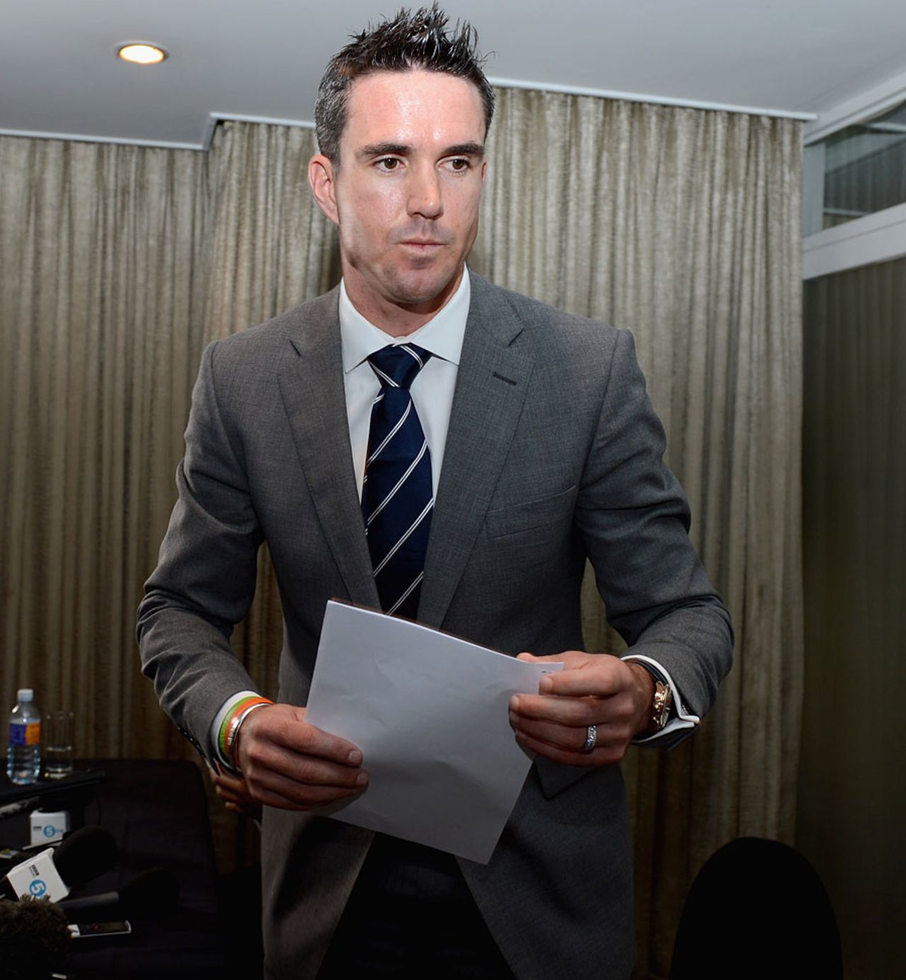 Kevin Pietersen leaves his press conference, Colombo, October 3, 2012