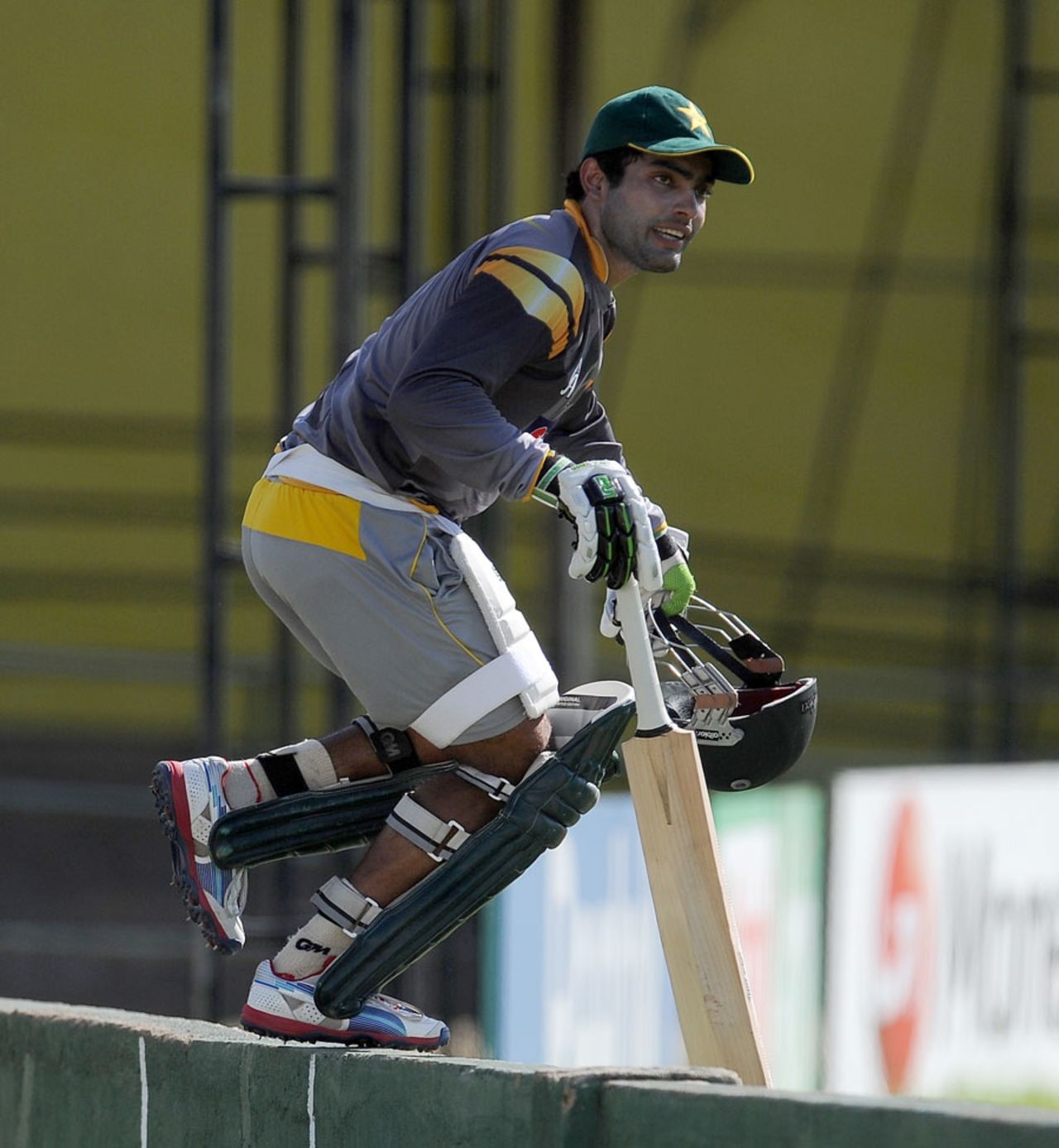 Umar Akmal heads for a training session on the eve of the semi-final against Sri Lanka, World Twenty20, Colombo, October 3, 2012