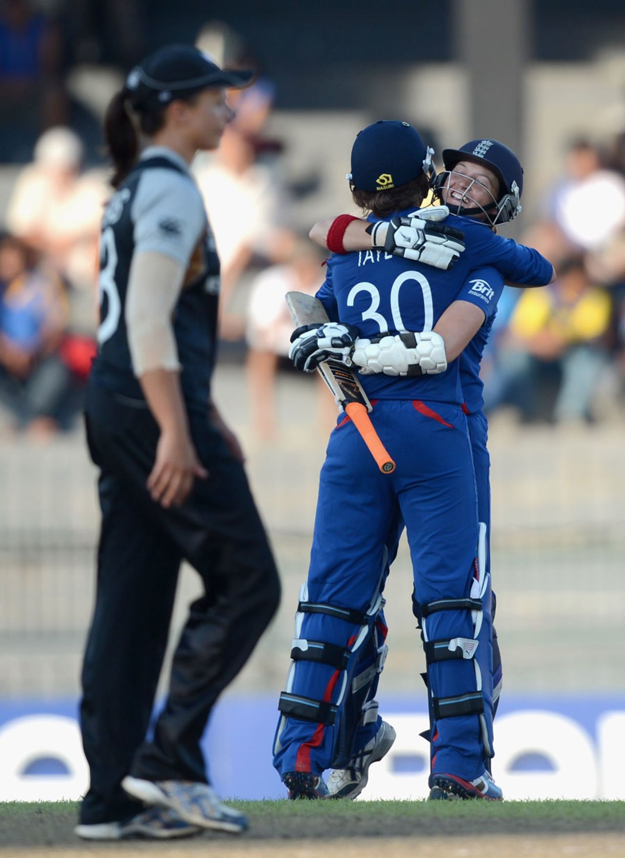 Sarah Taylor hugs Arran Brindle after England completed victory, England v New Zealand, 1st semi-final, Women's World T20, Colombo, October 4, 2012