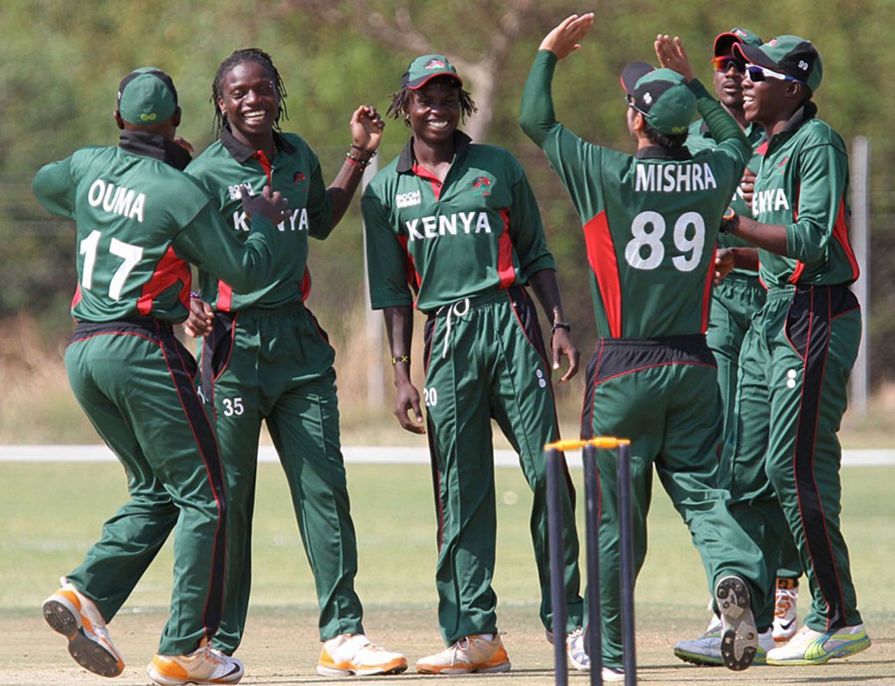Nehemiah Odhiambo and his team-mates celebrate a wicket, Kenya v Namibia, World Cricket League Championship, Windhoek, October 4, 2012