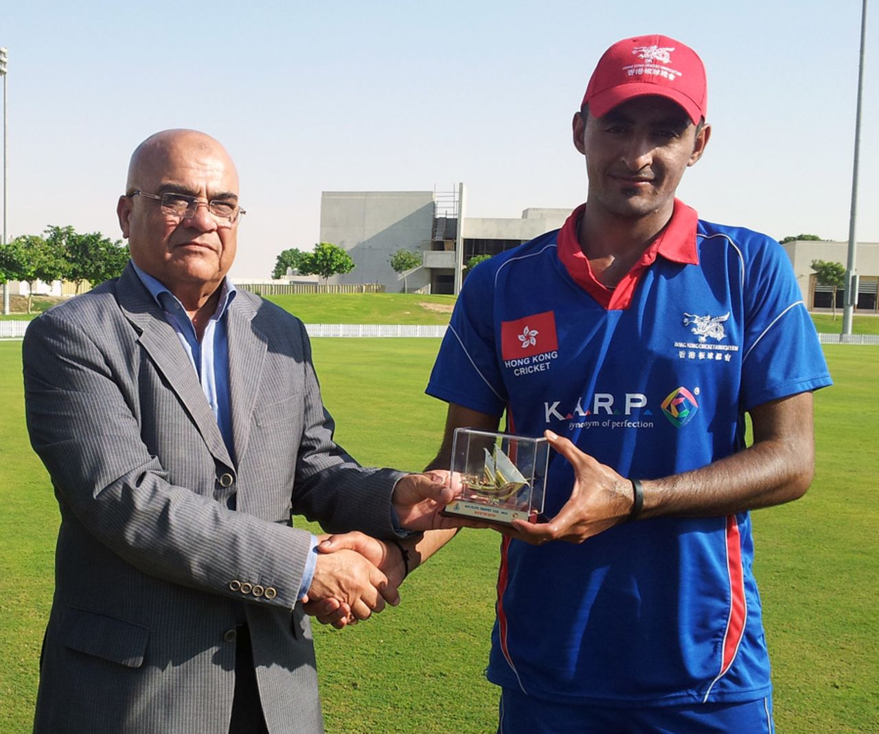 Hong Kong's Nizakat Khan is presented with the Man of the Match award after scoring 65 against Saudi Arabia after their ACC Trophy Elite 2012 Group B match at the ICC Global Cricket Academy, Dubai